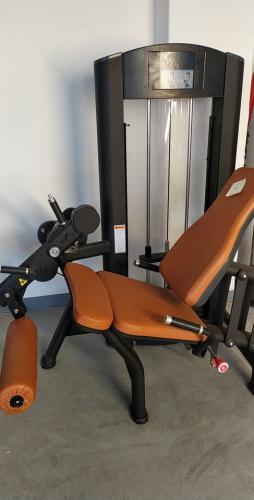 Seated Leg Extension selectorized exercise machine with magnetic Pin.